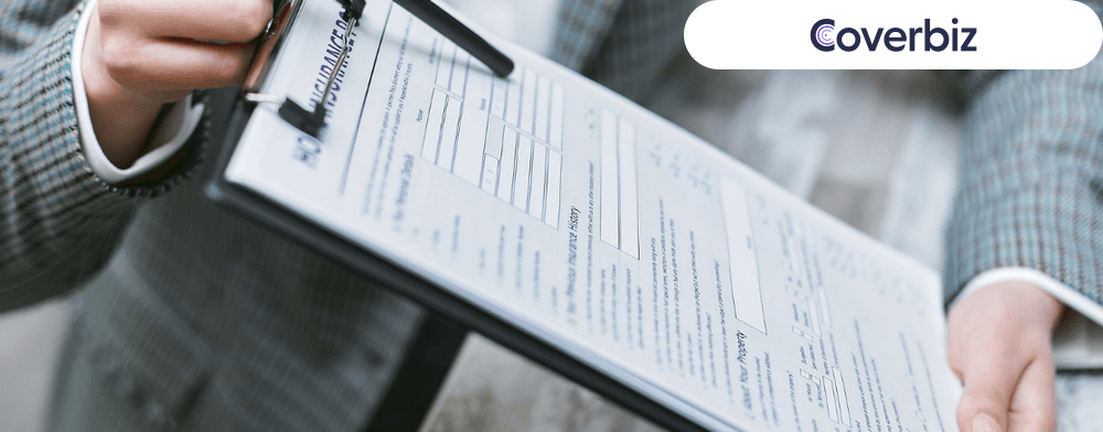 a hand showing a document attached in a clipboard