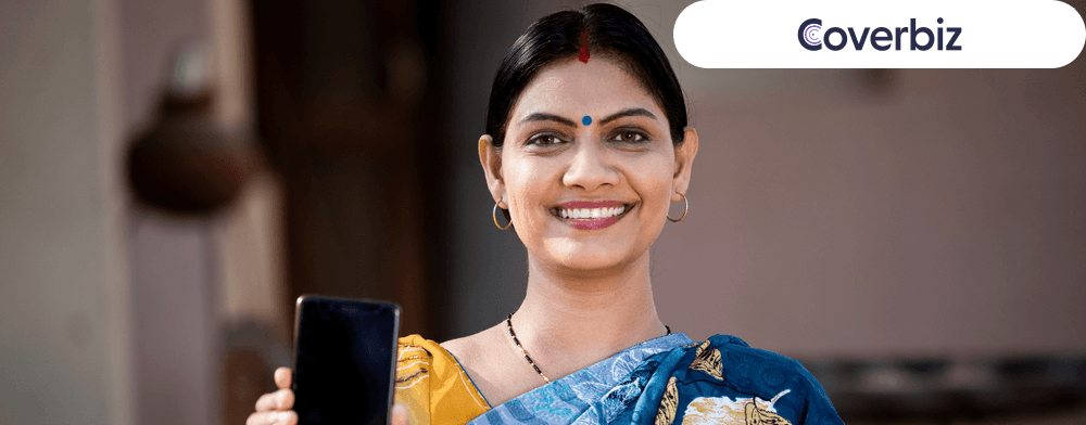 A woman entrepreneur is seen to be holding a phone