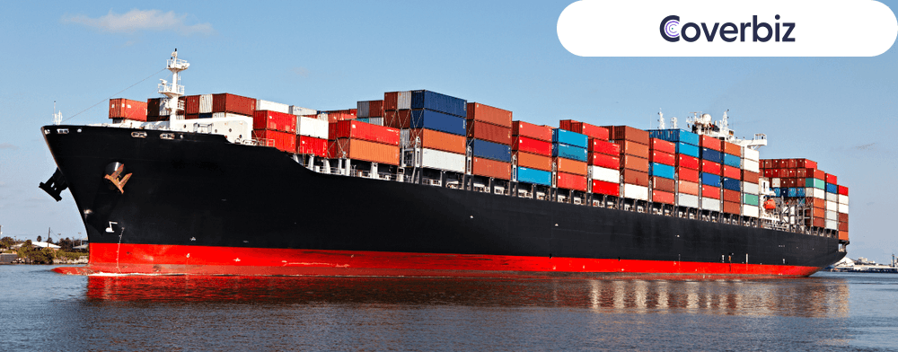 This is an image about a ship sailing with cargo mid-sea