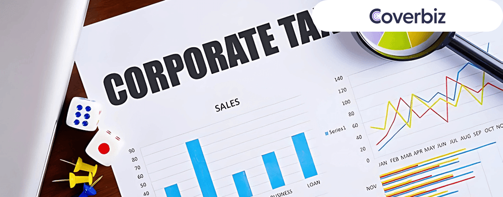 A bar graph sheet lying with the words corporate tax written on it