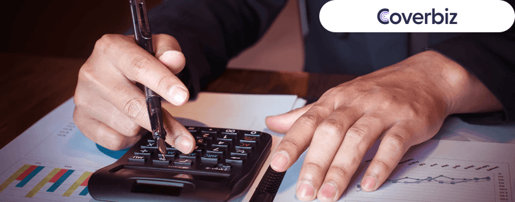 A person calculating the difference between operating profit and net profit